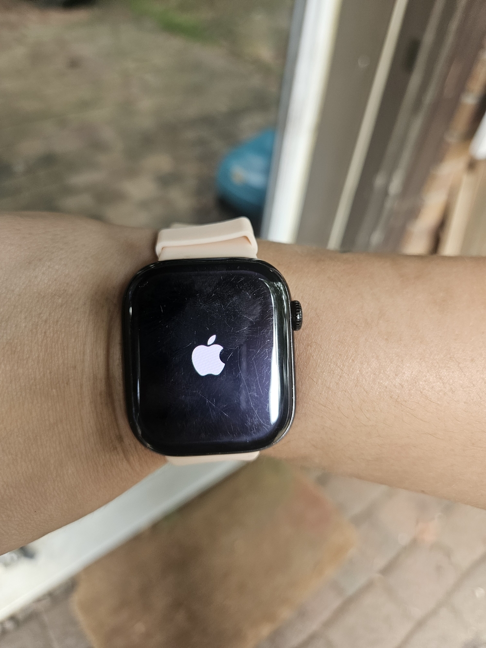 Apple Watch with Pale Pink Silicone Band and Black Case